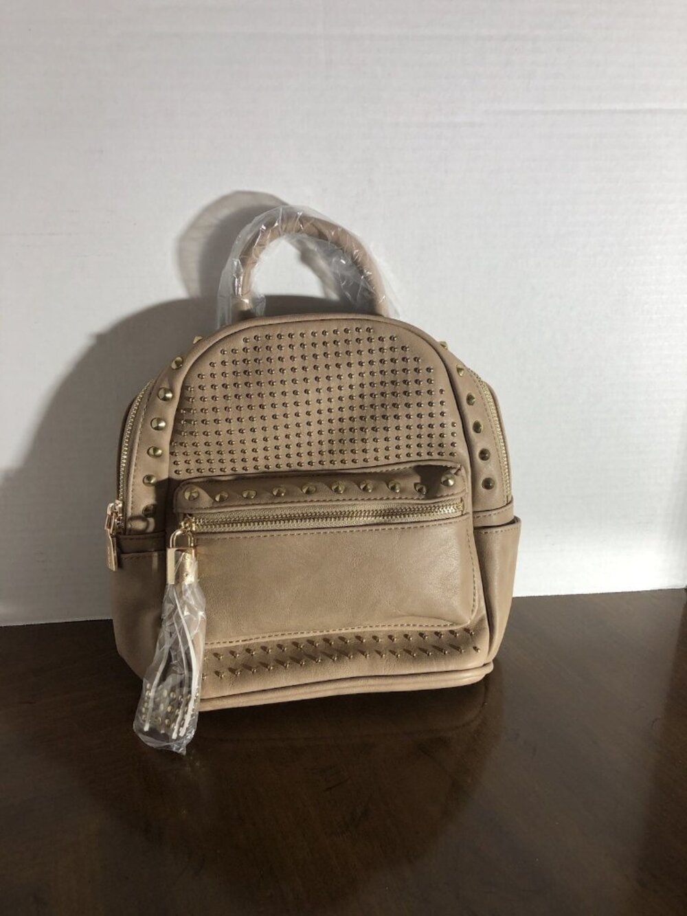 Brentano Studded Backpack In Sand 8” x 9” x 5”